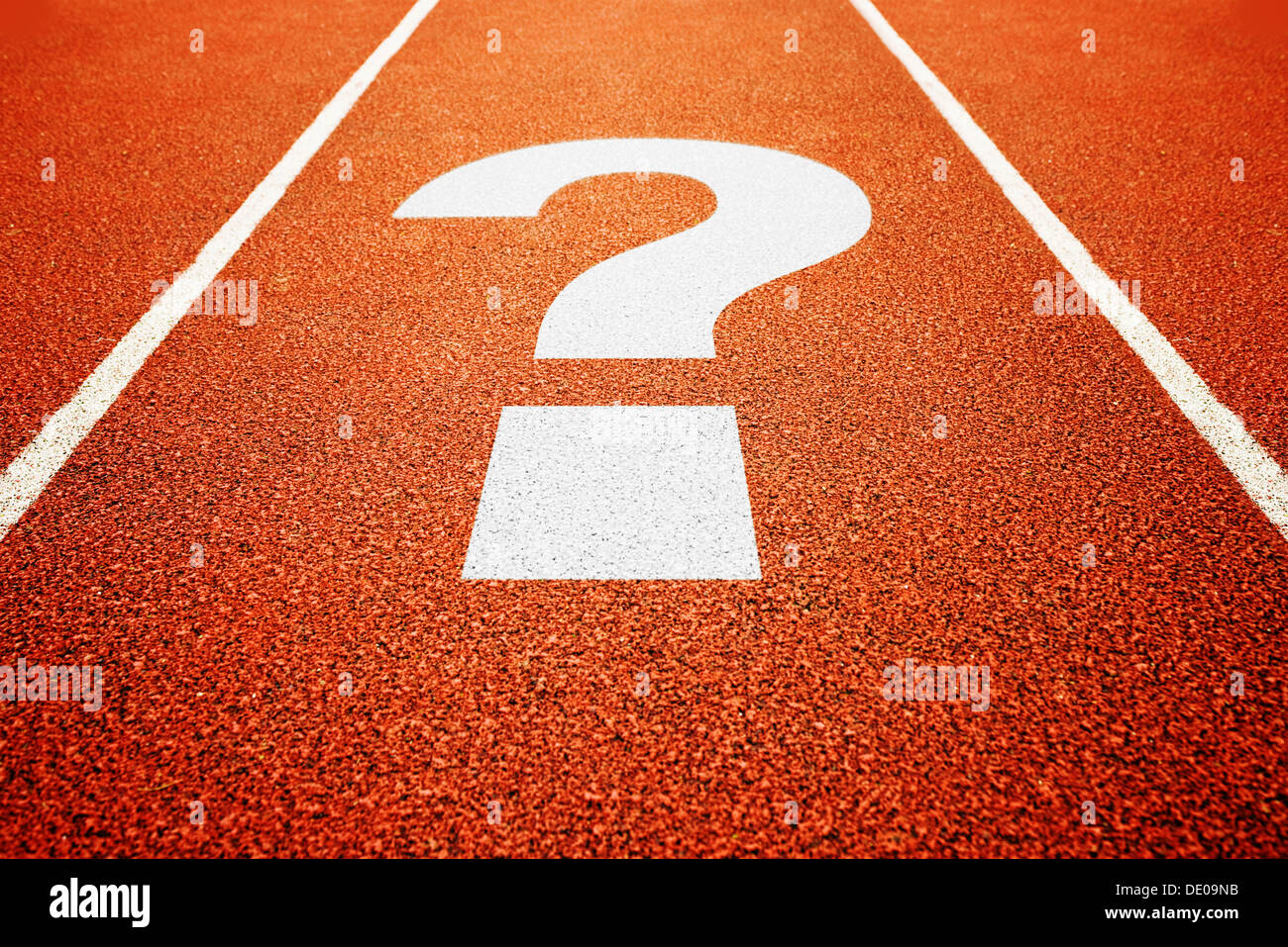 question mark on athletics all weather running track Stock Photo Alamy
