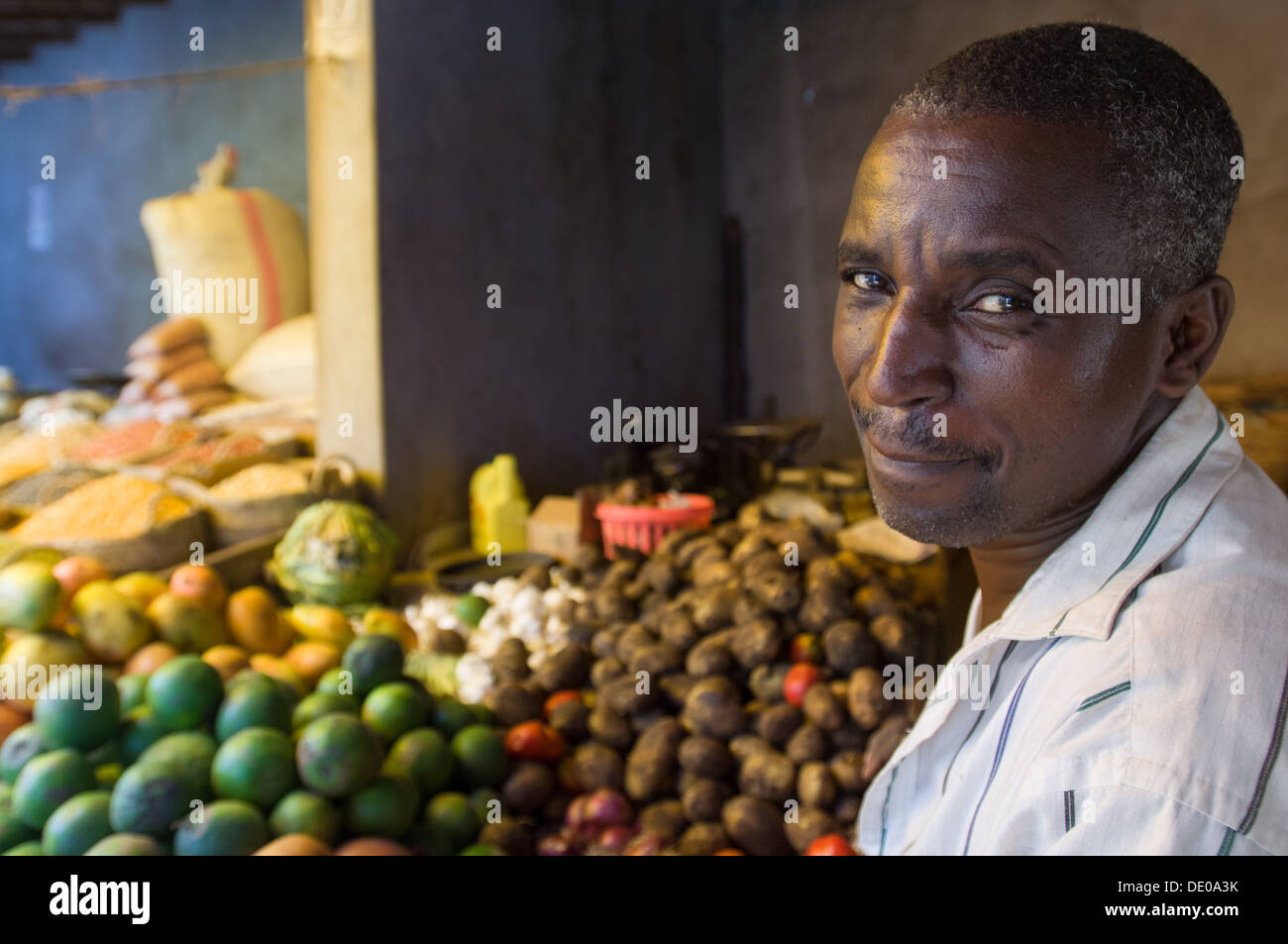 Stallholder at Lamu Market, Lamu, Kenya Stock Photo