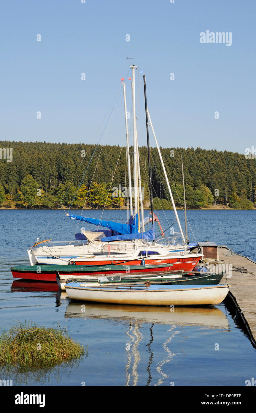 Sailboats on a dock, Bruchertalsperre Reservoir, Marienheide, Bergisches Land, North Rhine-Westphalia, PublicGround Stock Photo