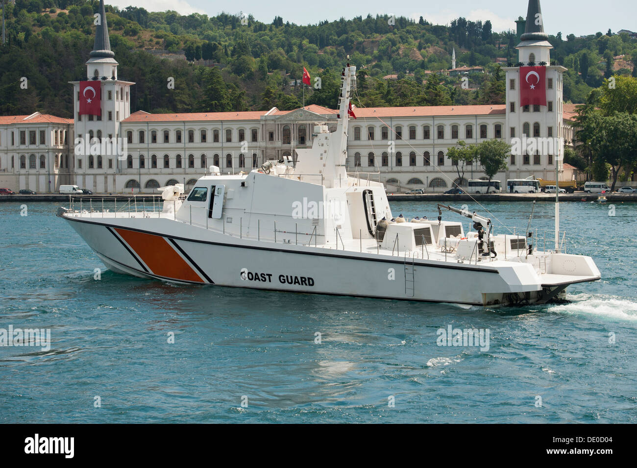 Coast guard vessel in turkey on bosphorus river with parliament ...