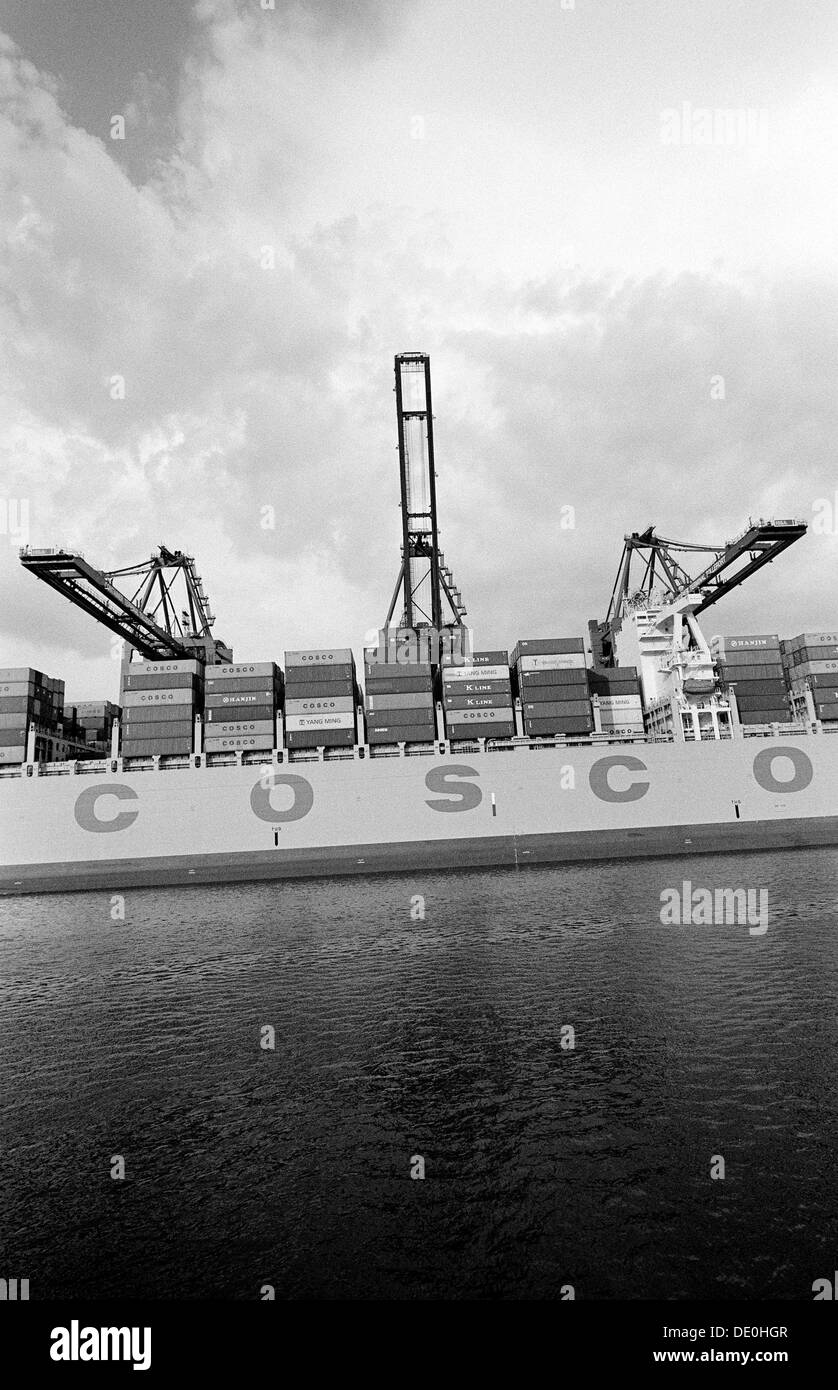 Chinese container ship COSCO France at Tollerort Container Terminal (CTT) in the German port of Hamburg. Stock Photo