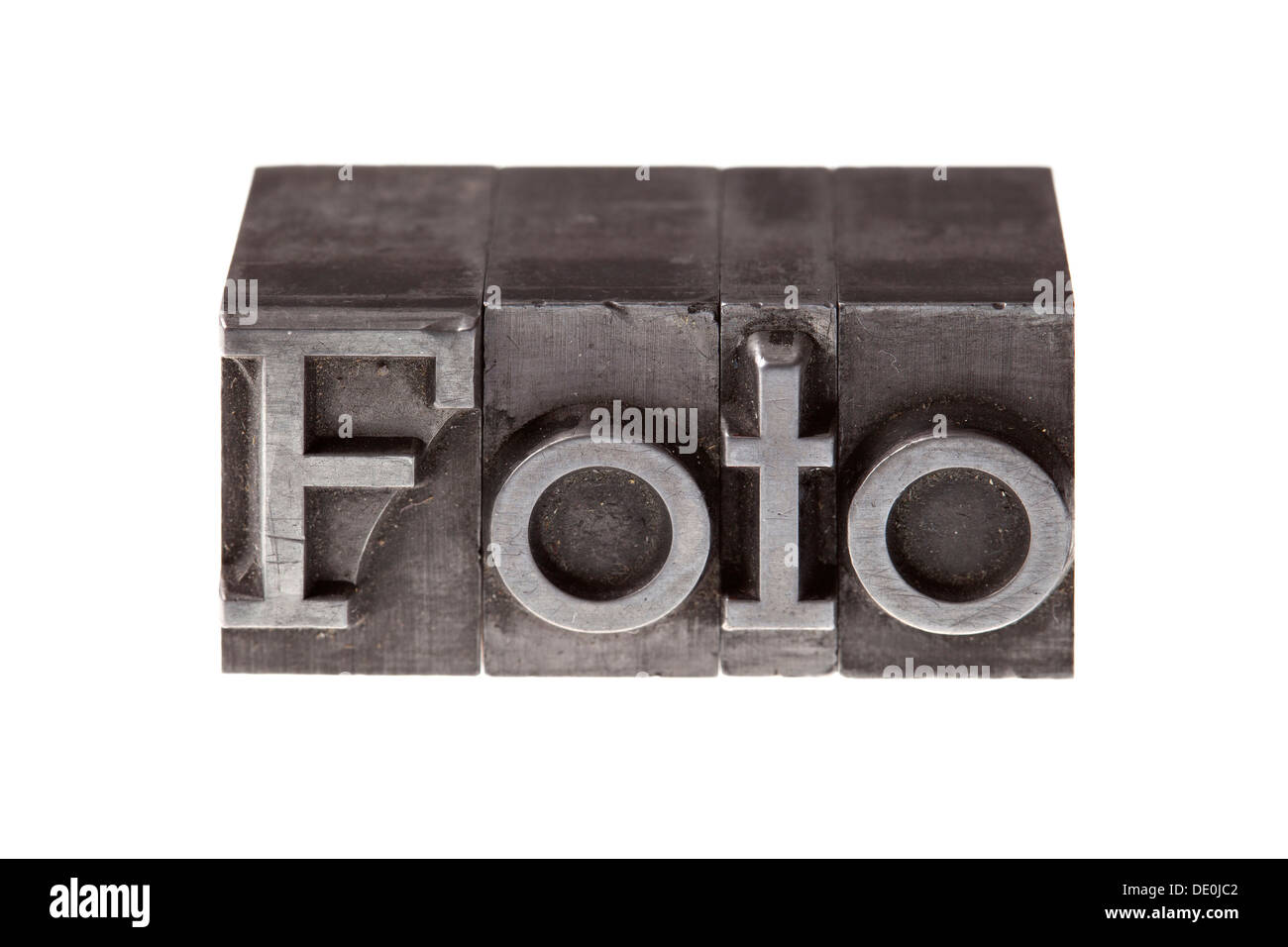 Old lead letters forming the word 'Foto', German for 'photo' Stock Photo