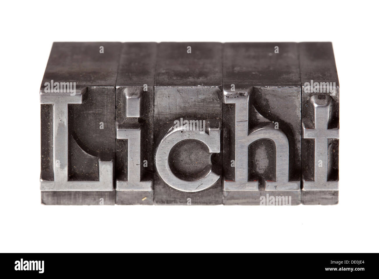 Old lead letters forming the word 'Licht', German for light Stock Photo