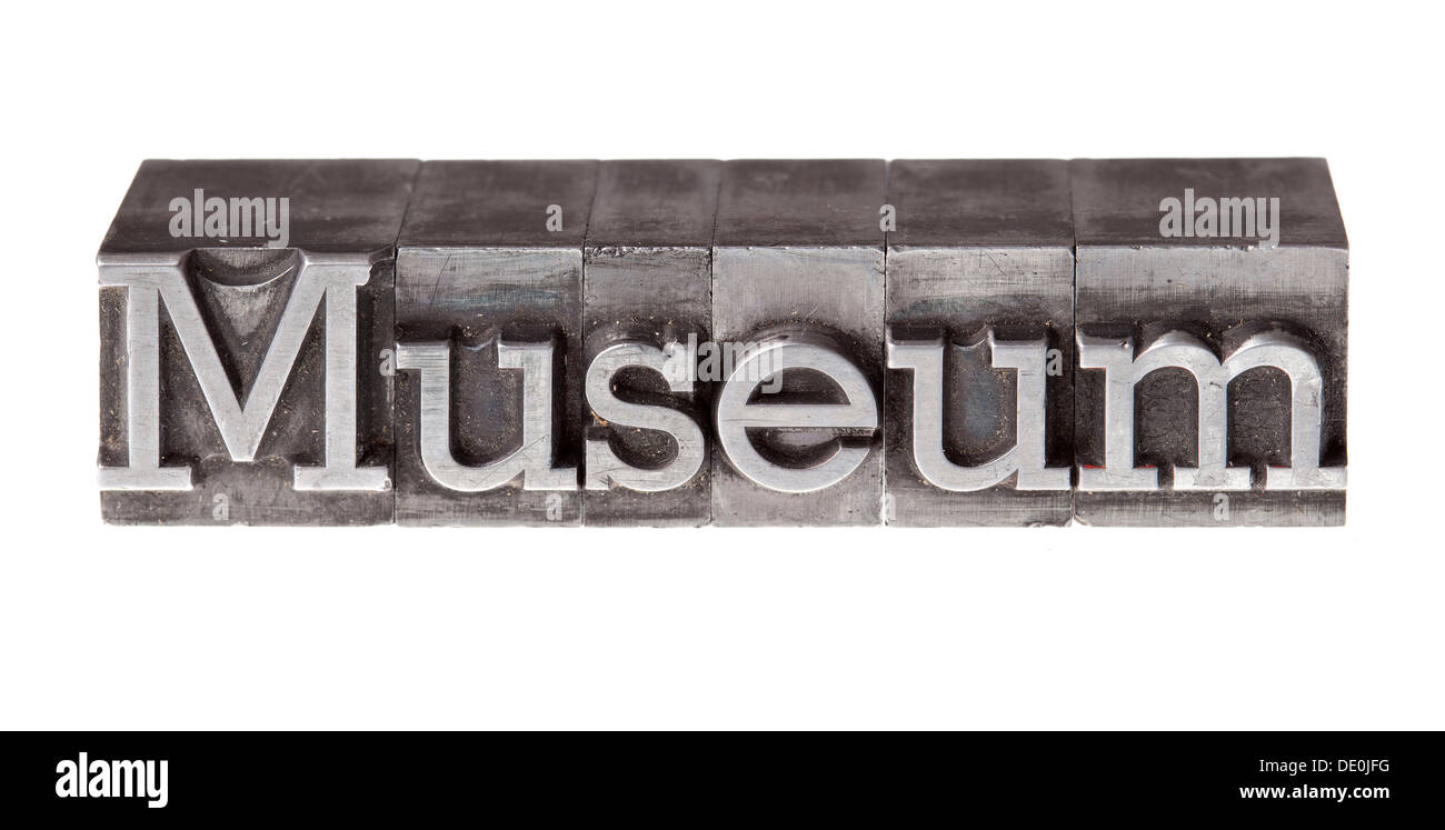 Old lead letters forming the word 'Museum' Stock Photo