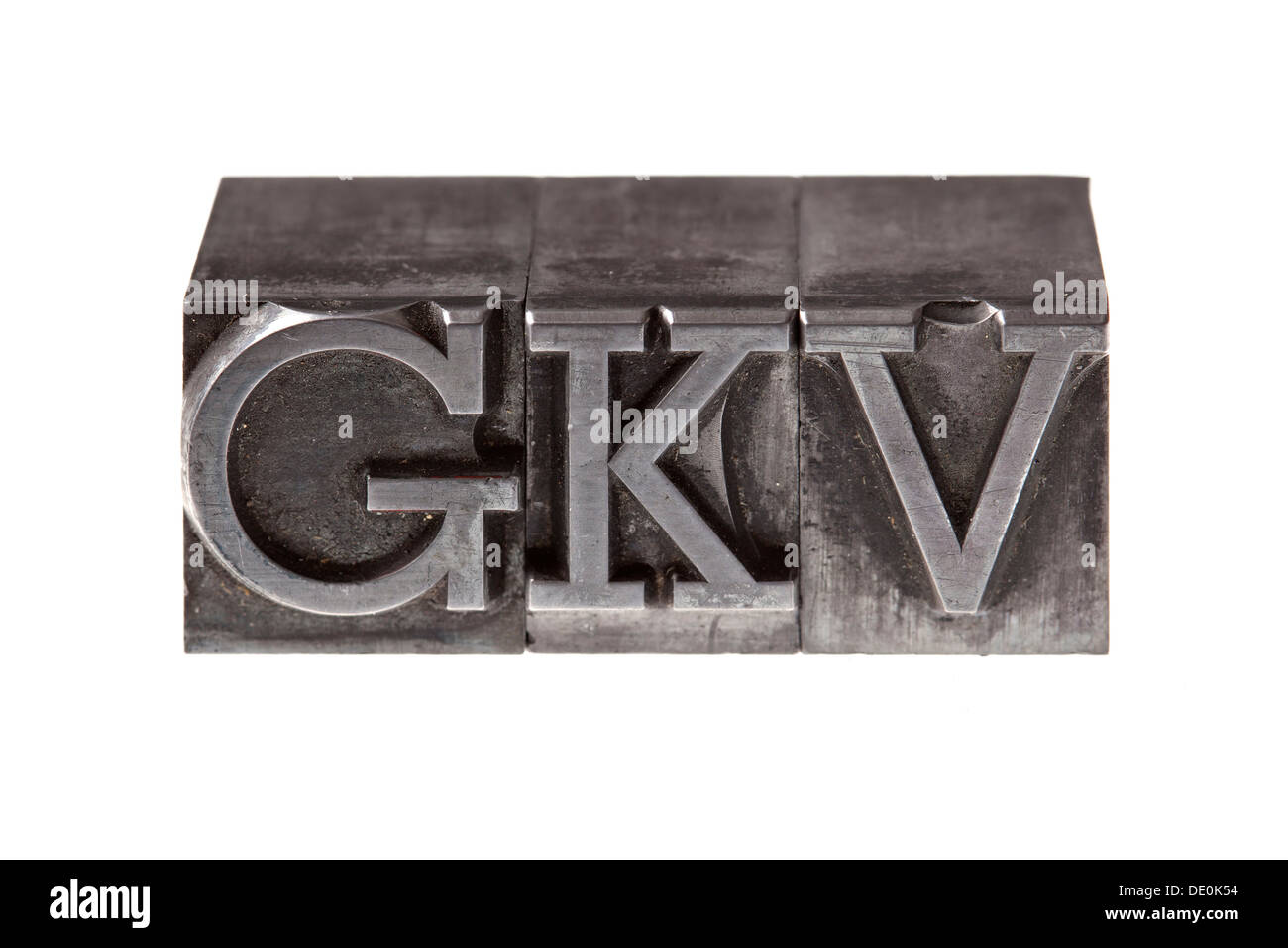 Old lead letters forming the acronym 'GKV' Stock Photo