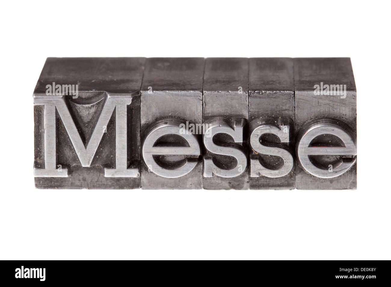 Old lead letters forming the word 'Messe', German for trade fair Stock Photo
