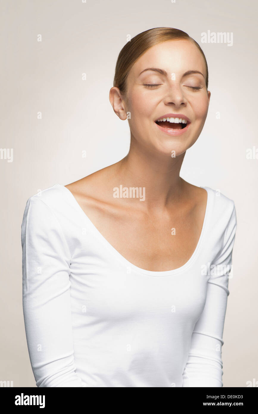 Young woman laughing Stock Photo
