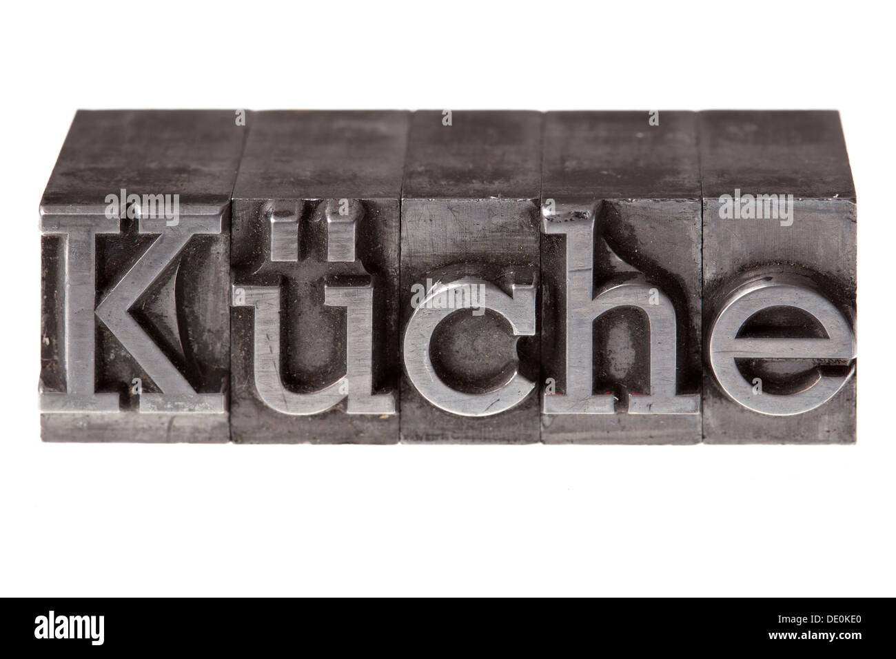 Old lead letters forming the word 'Küche', German for kitchen Stock Photo
