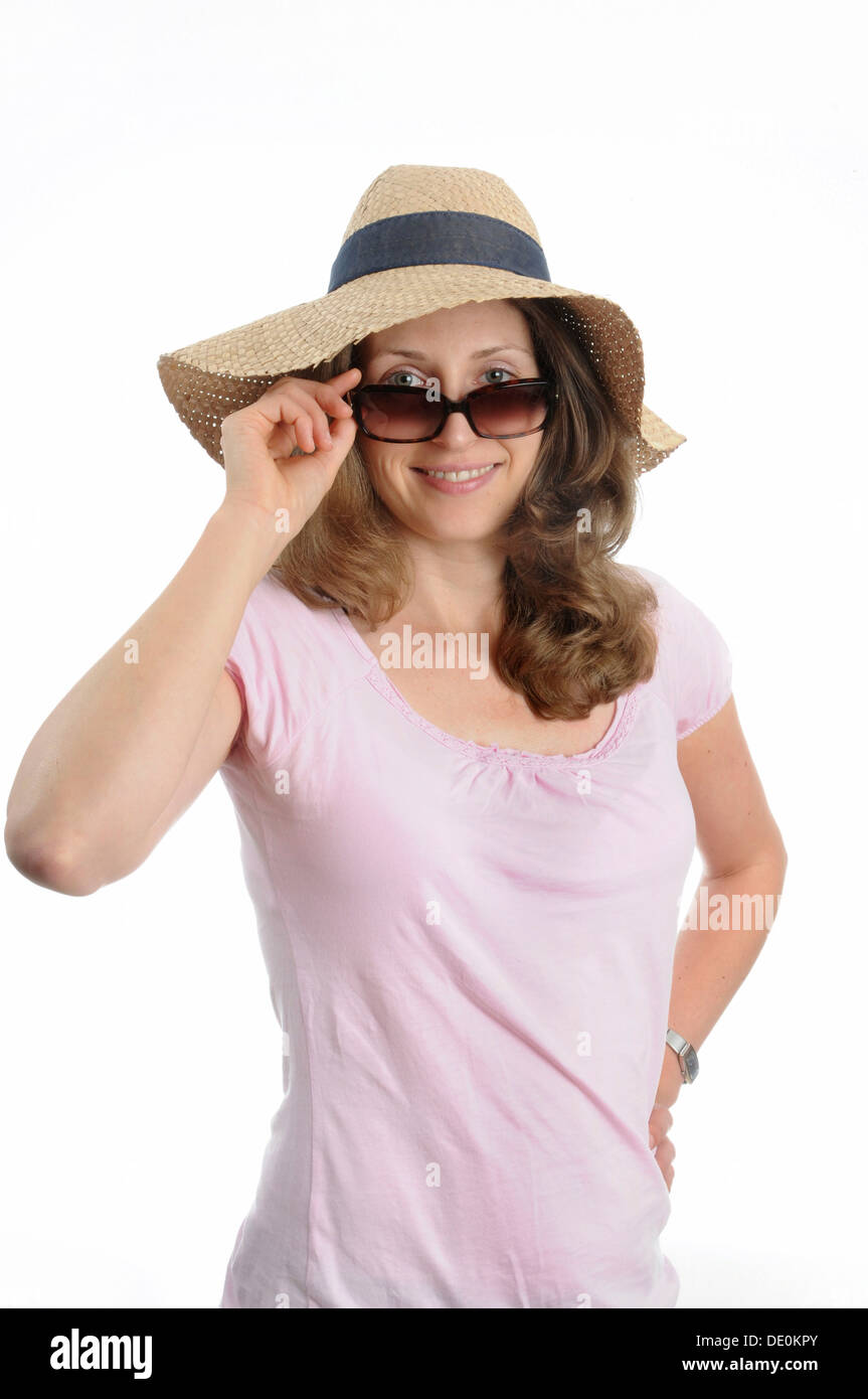 Young woman with sunglasses and a straw hat Stock Photo - Alamy