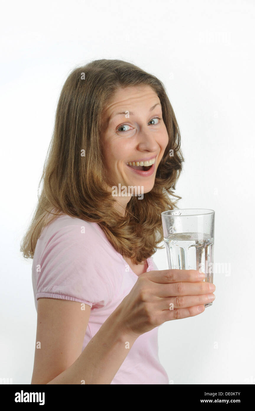 Young woman offering glass water hires stock photography and images