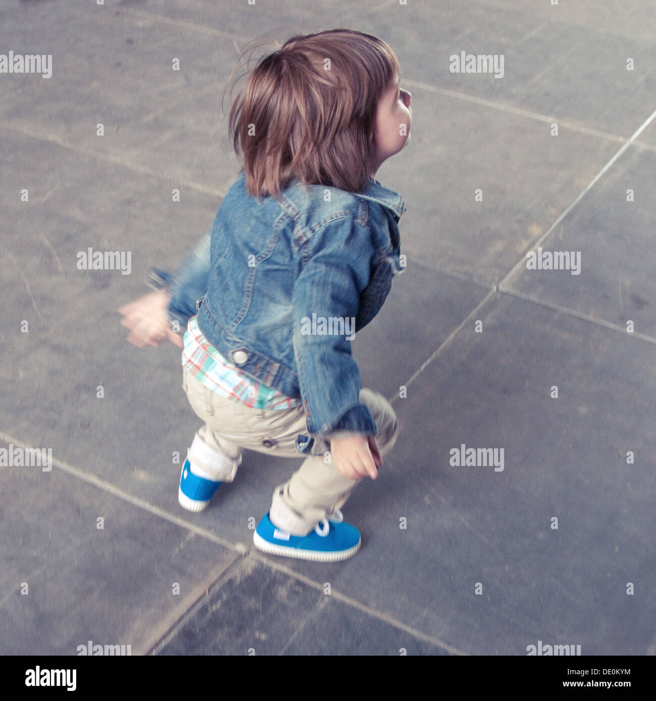Boy jumping outdoors Stock Photo - Alamy