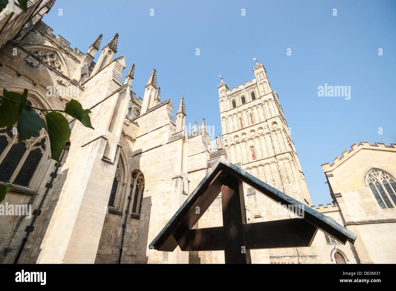 Exeter Cathedral rear yard looking up at the Gothic towers. Cathedral Church of Saint Peter at Exeter Stock Photo