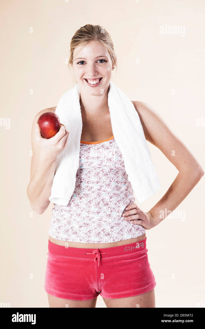Young athlete eating fruit at sport hi-res stock photography and images ...