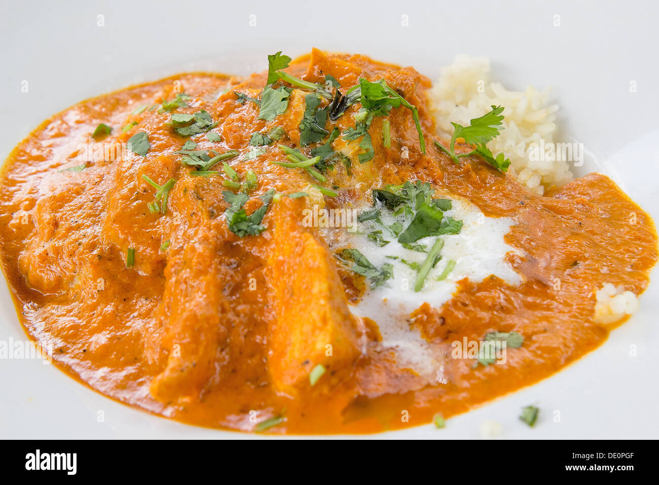 East Indian Butter Chicken Curry Over Basmati Rice with Naan Bread
