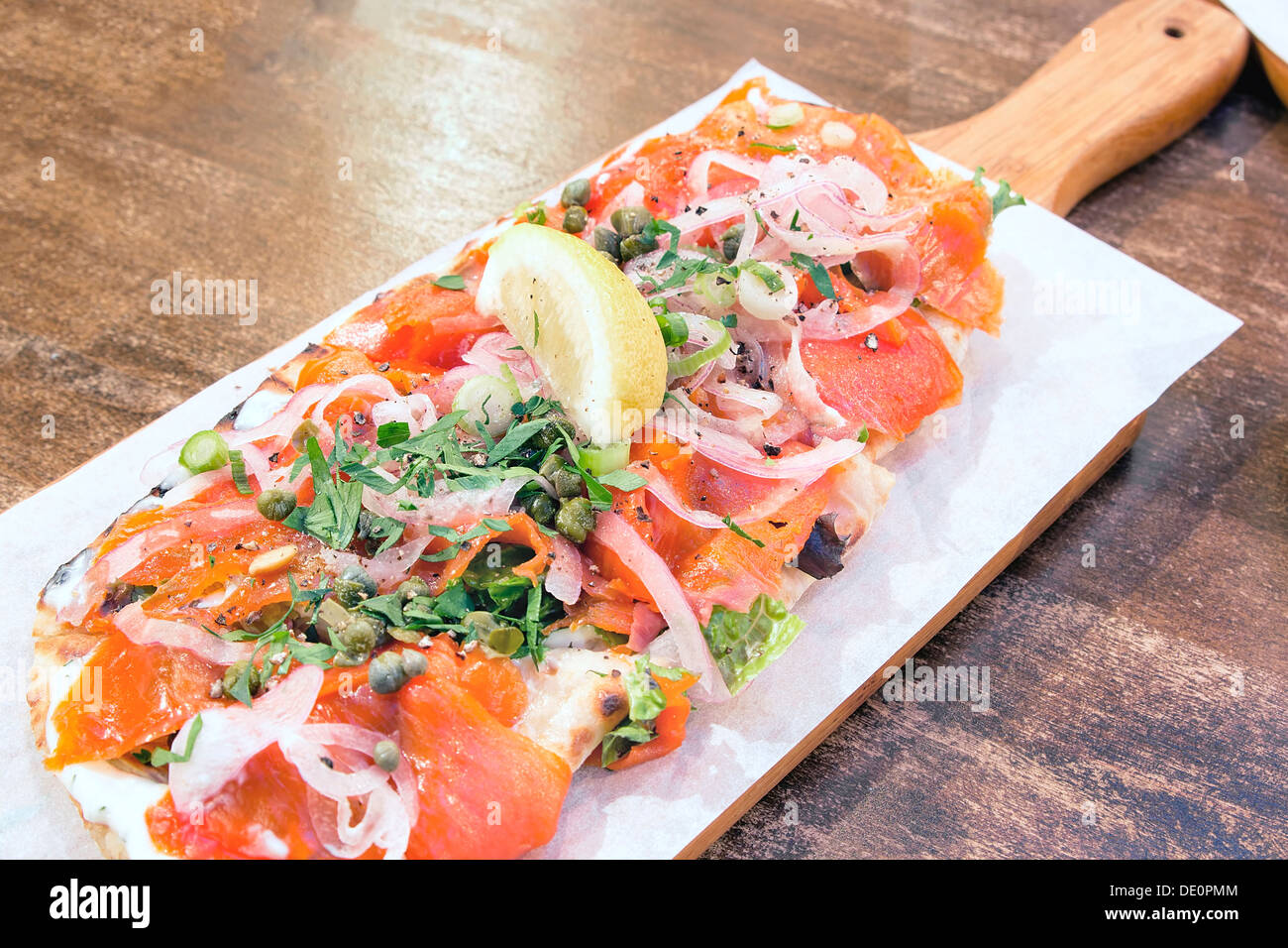 Smoked Salmon on Focaccia Bread with Cream Cheese Garnished with Onions Cilantro Scallions and