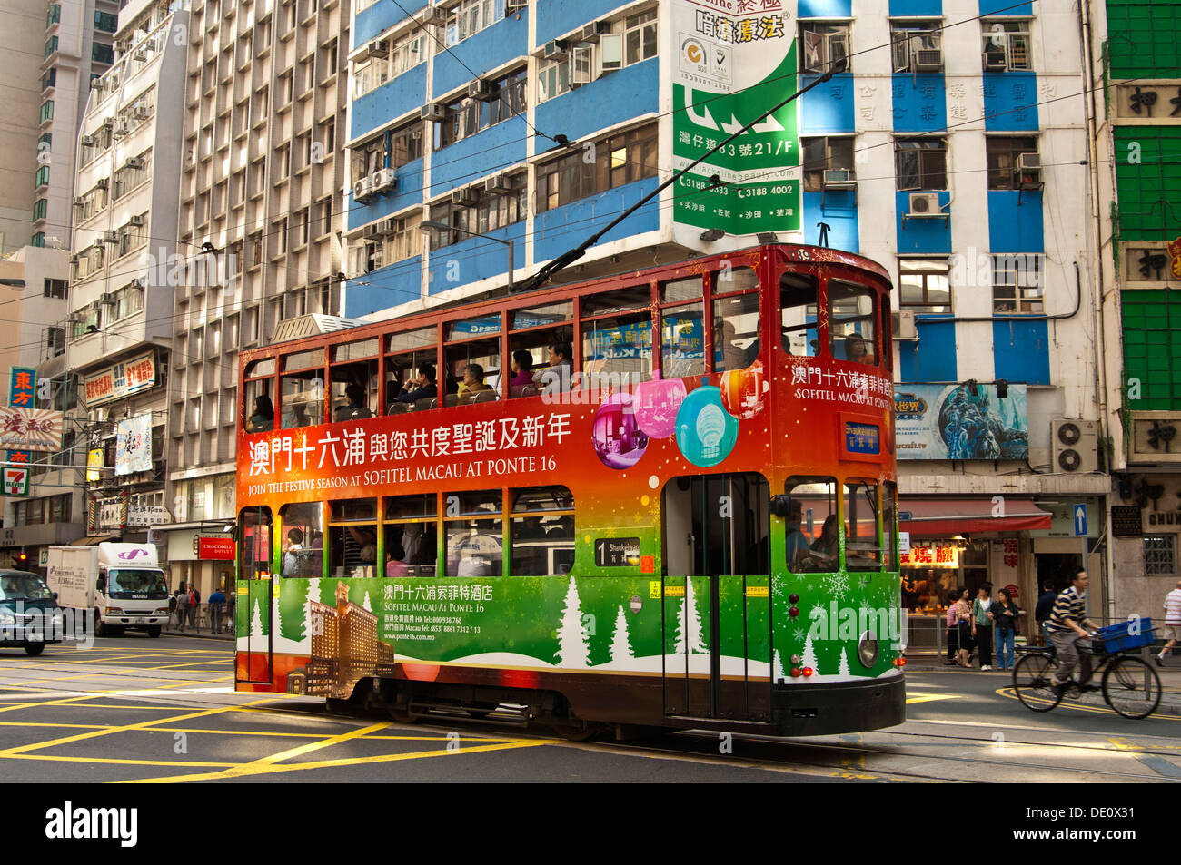 Double-deck tramcar of Hong Kong Tramways with tram body advertising, Hong Kong Stock Photo