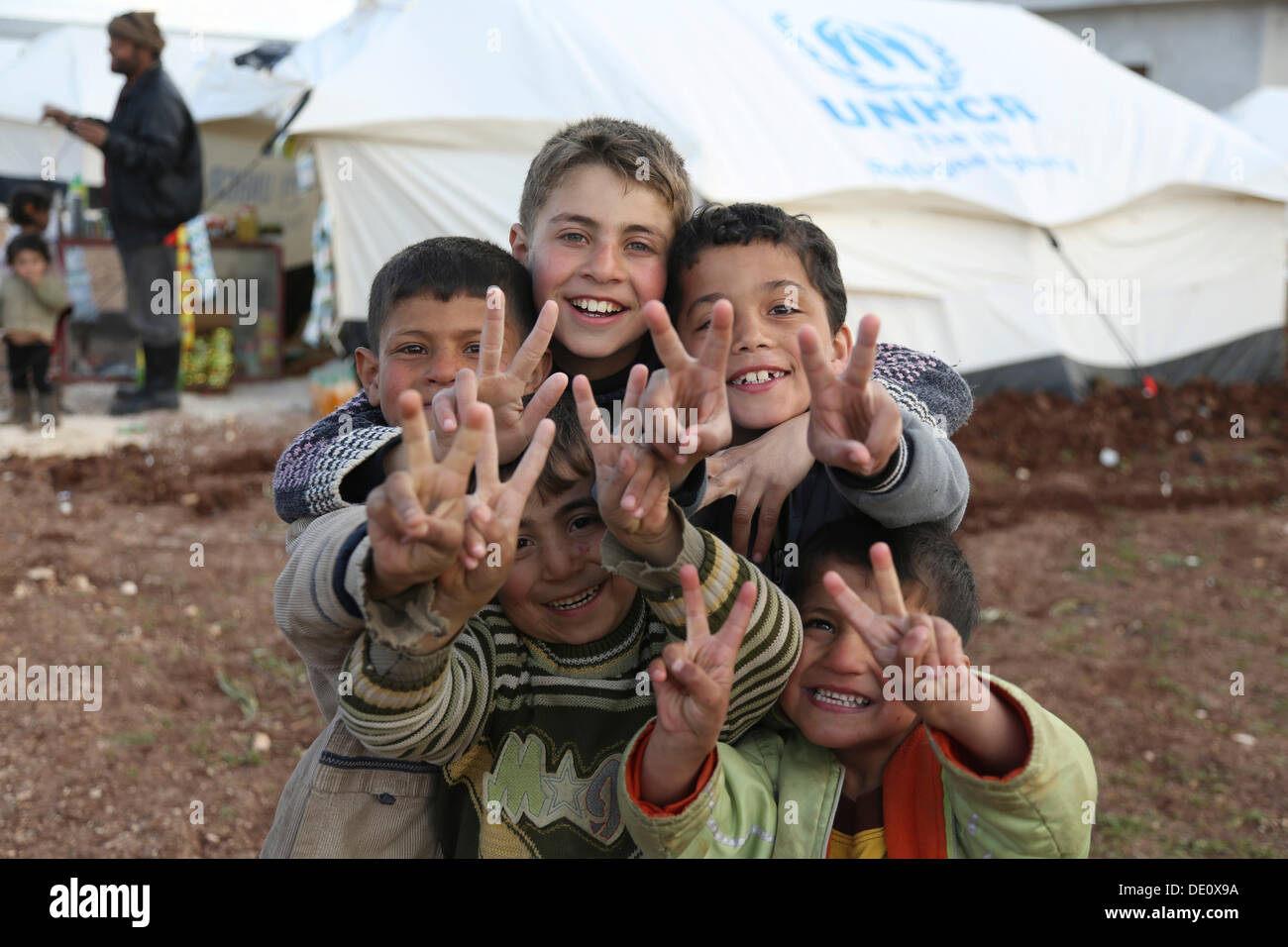 Children in a camp for Syrian refugees of the civil war near the Turkish border Stock Photo