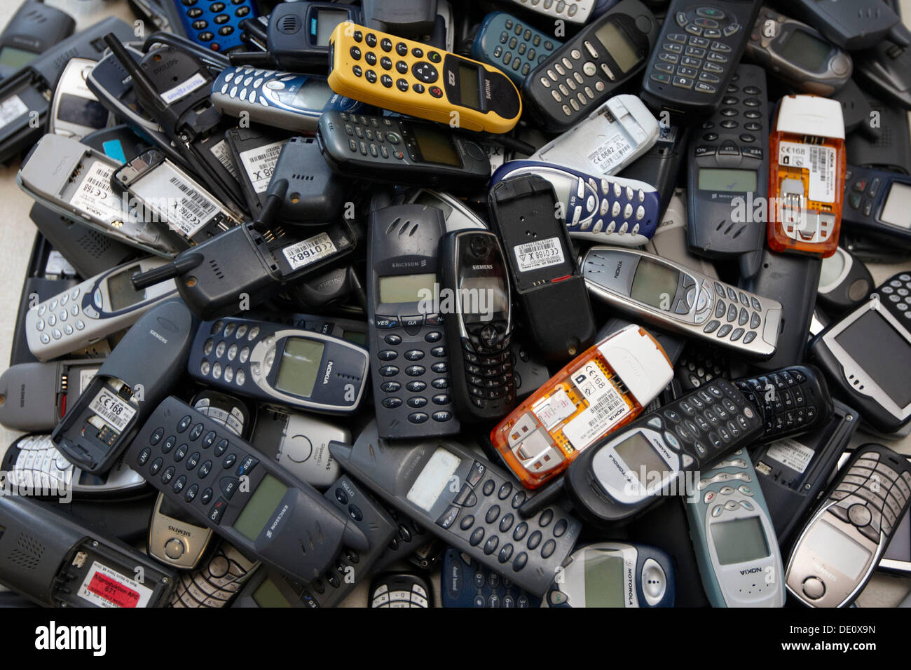 Cell phones, old mobile phones on a pile Stock Photo