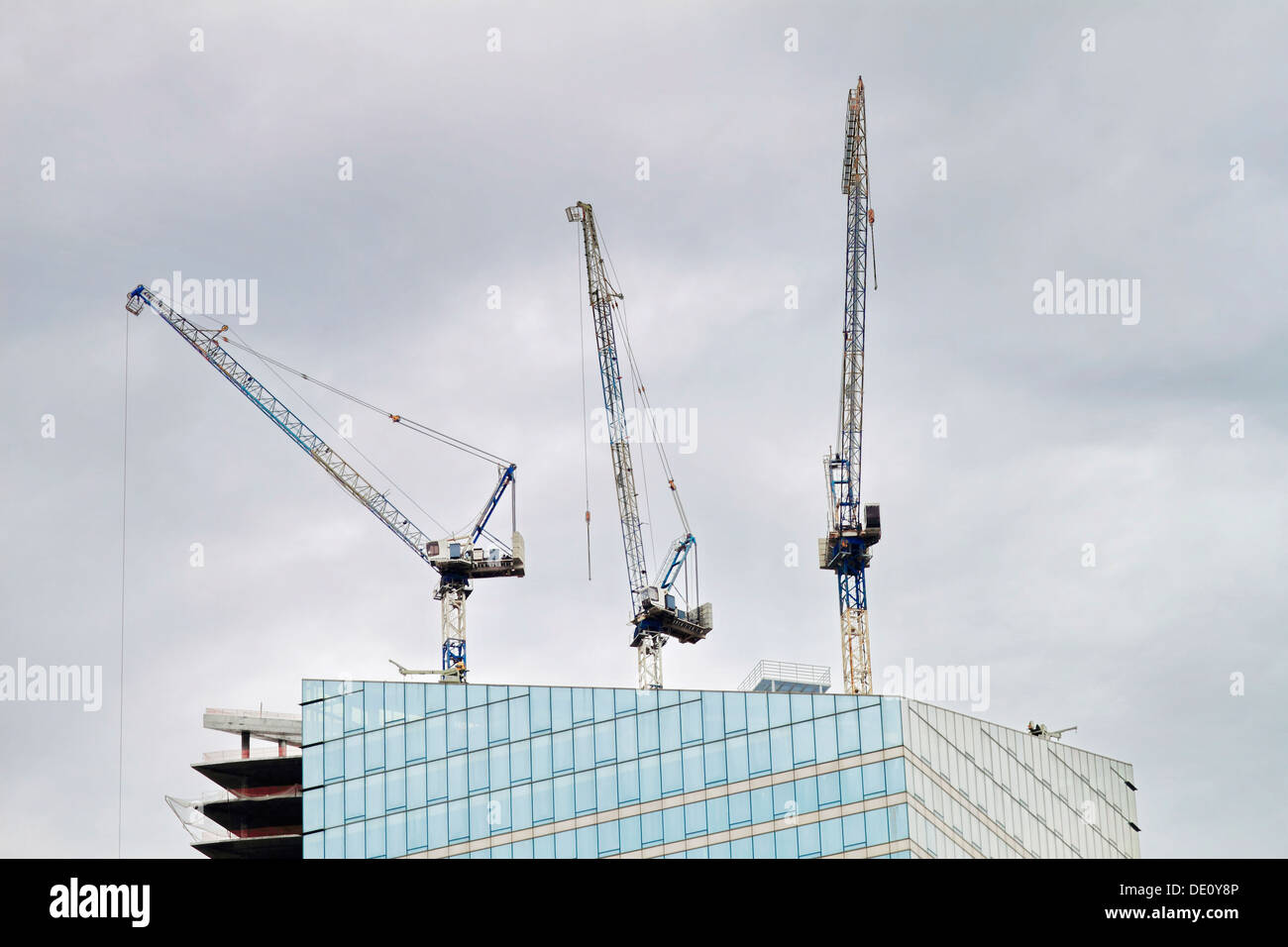 construction cranes on the roof Stock Photo