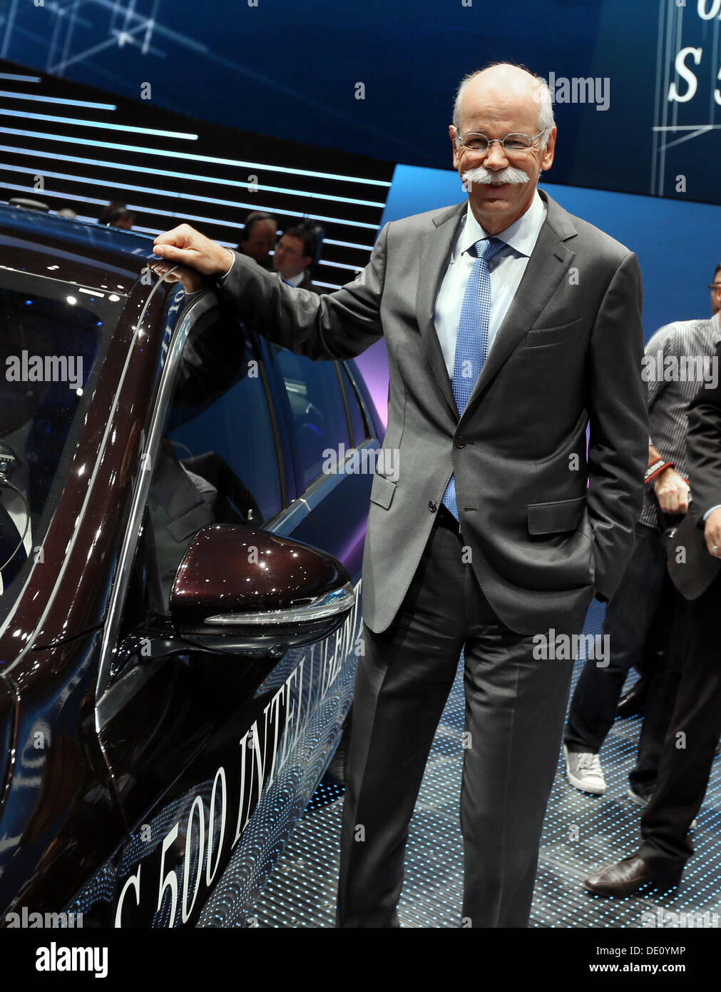 Frankfurt Main, Germany. 09th Sep, 2013. Chairman of Daimler AG, Dieter Zetsche, stands next to a Mercedes S500 Intelligent Drive at the 'Mercedes-Benz & smart Media Night' on the evening before the start of the first press day of the Frankfurt Motor Show (IAA) in Frankfurt Main, Germany, 09 September 2013. The car is capable of navigating traffic without a driver. Almost 1100 exhibitors will present their novelties at the automotive trade show from 12 till 22 September 2013. Photo: FRANK RUMPENHORST/dpa/Alamy Live News Stock Photo