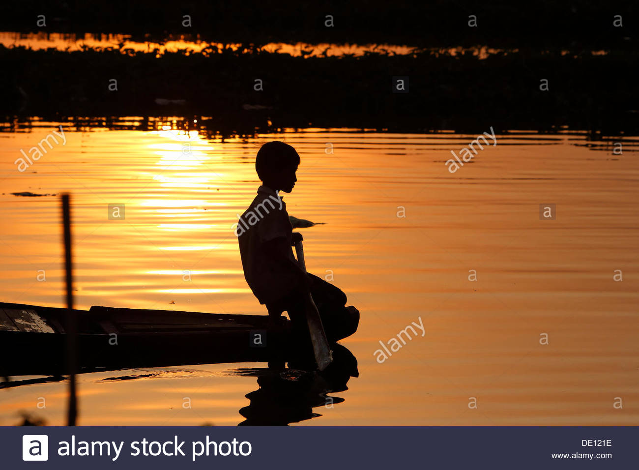Boy In A Boat High Resolution Stock Photography and Images - Alamy