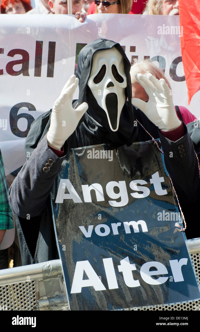 Sign 'Angst vorm Alter', German for 'fear of old age', May day rally, Marienplatz square, Munich, Bavaria Stock Photo
