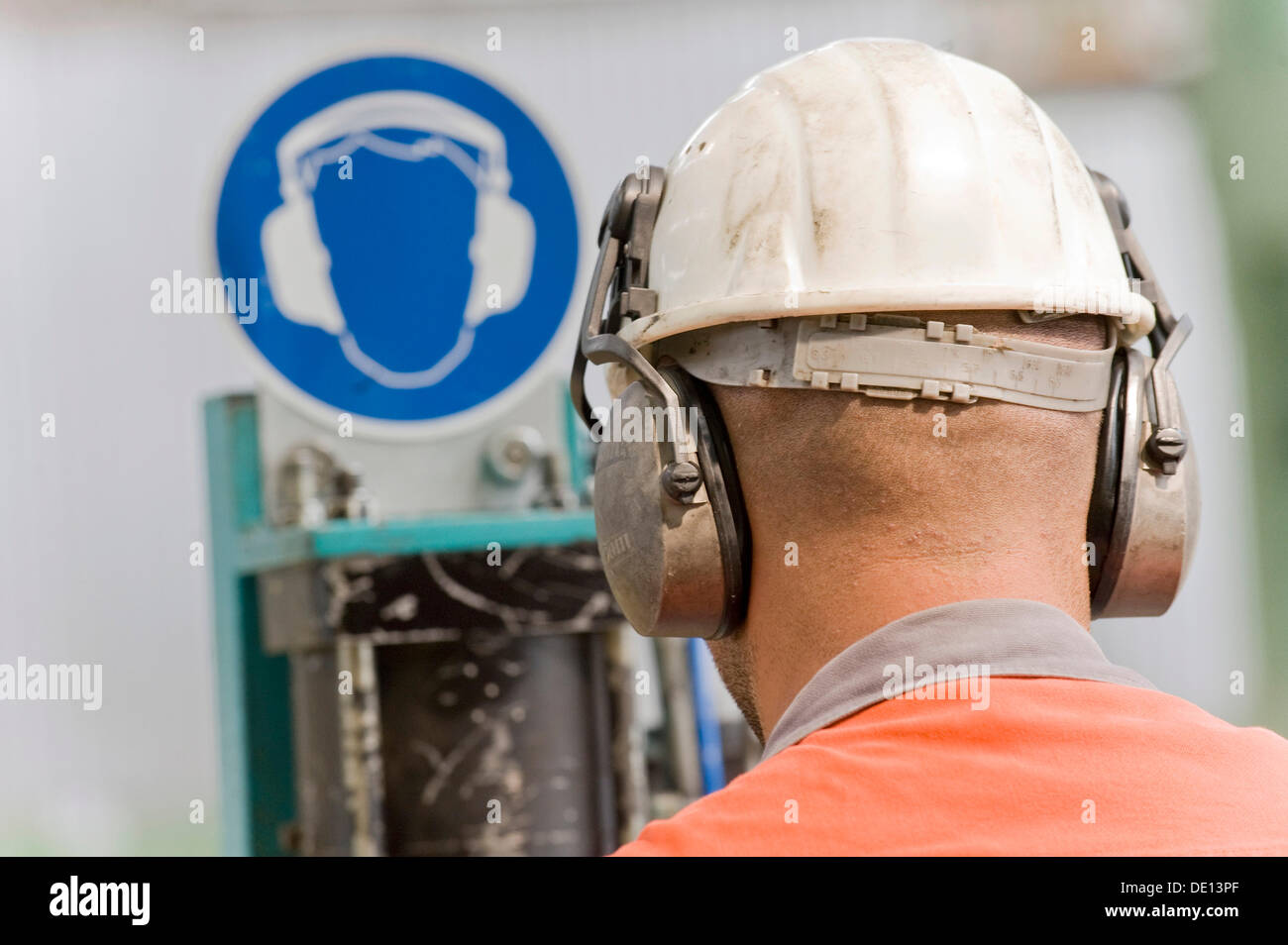 Worker wearing ear defenders hires stock photography and images Alamy