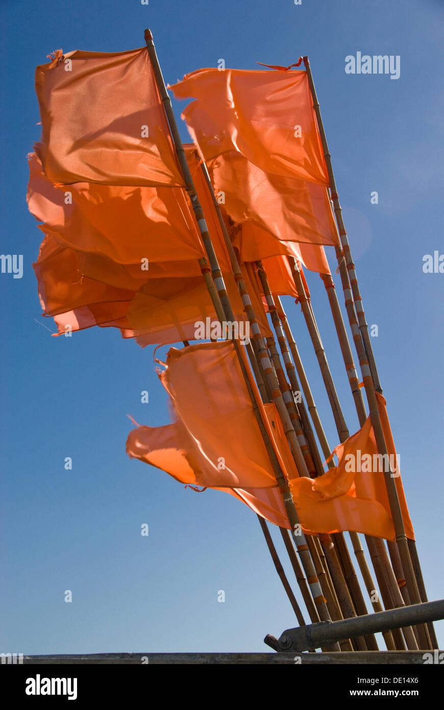 Marking flags on fishing boat in the wind, Denmark, Europe Stock Photo