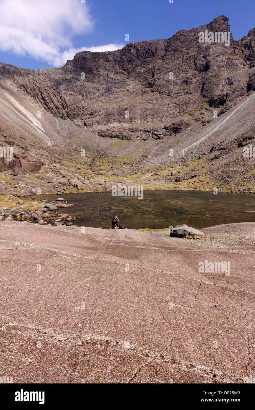 Glaciated mountain corrie, Sgurr Mhic Choinnich and lake high in the Black Cuillin mountains, Coire Lagan, Glenbrittle, Isle of Skye, Scotland, UK. Stock Photo