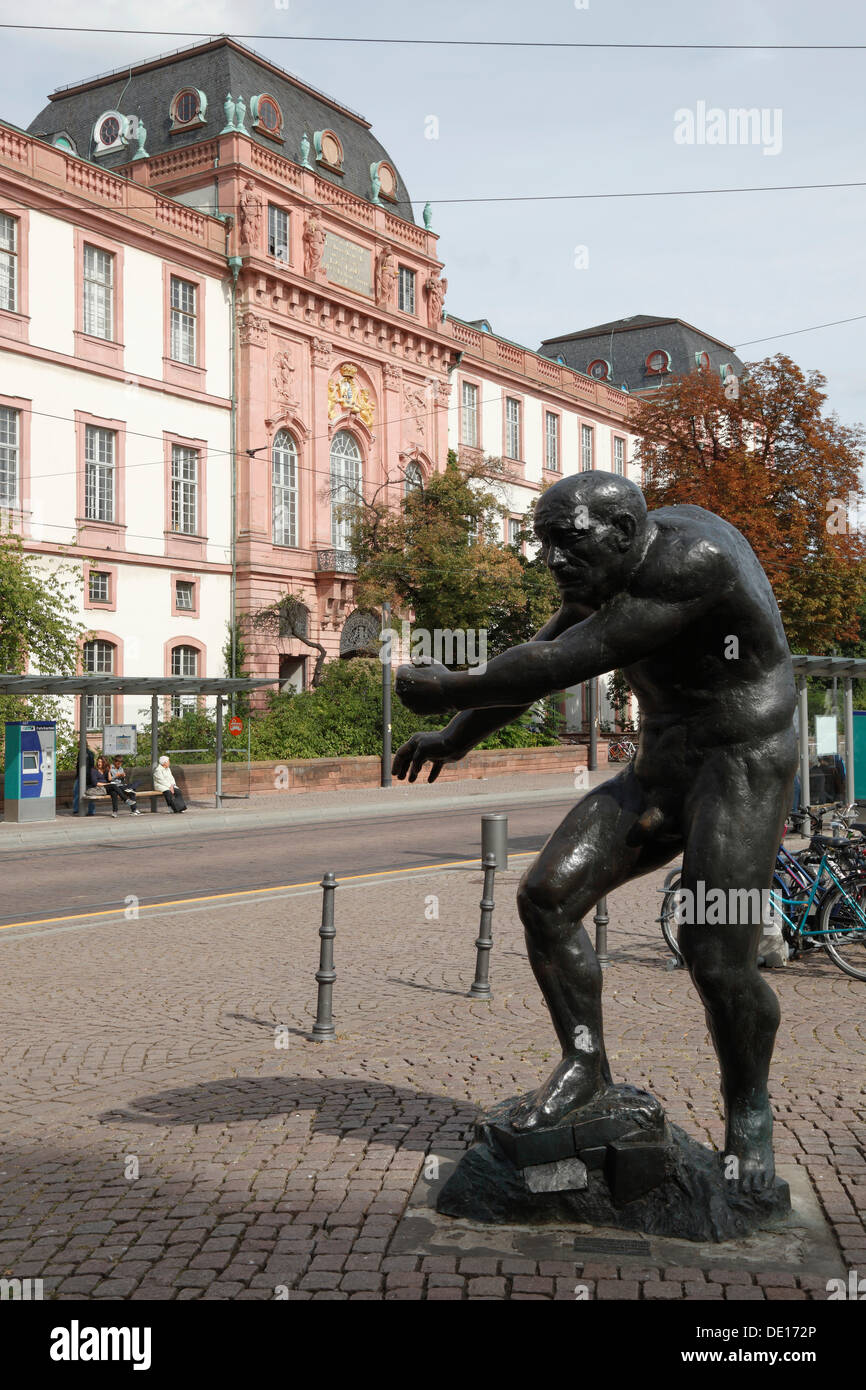 Berserker, sculpture by Waldemar Grzimer, Ducal Palace of Darmstadt at the back, today accommodating part of the University of Stock Photo