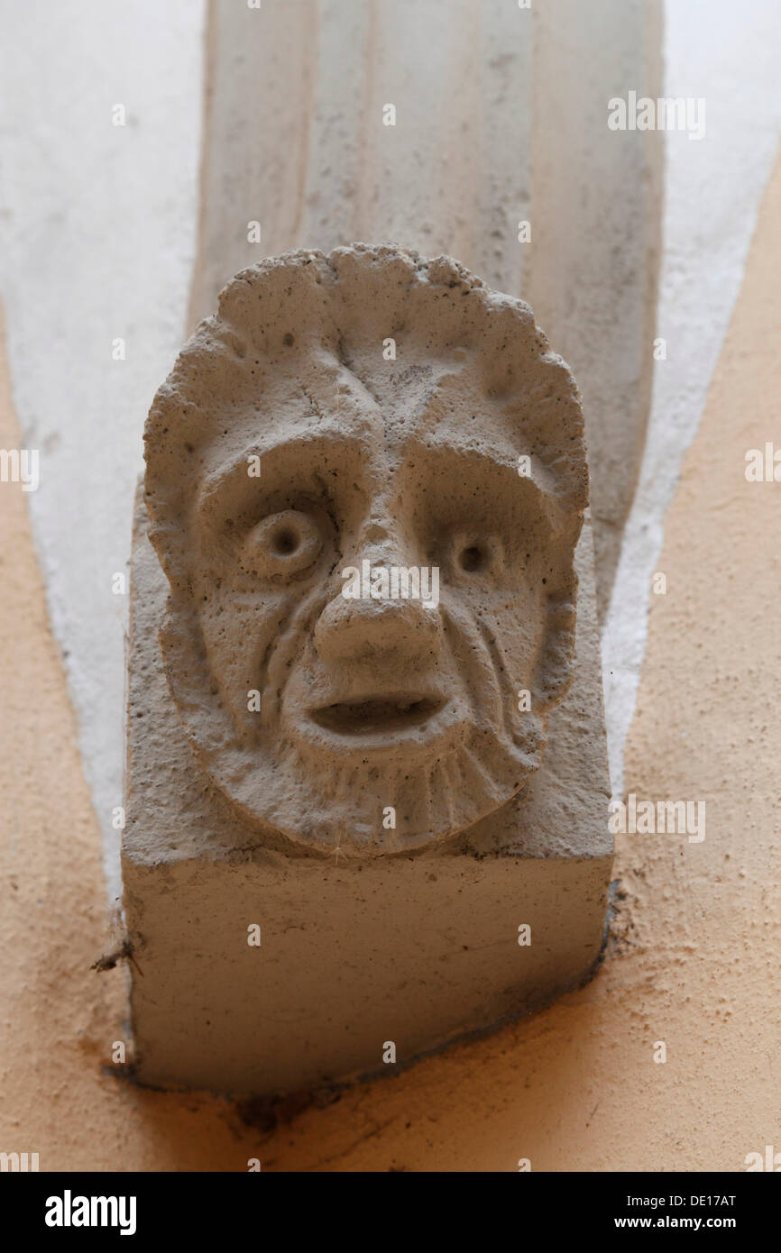 Grotesque face, sculpture of a head on a ribbed vault, Schloss ob Ellwangen castle, Ellwangen an der Jagst, Baden-Wuerttemberg Stock Photo