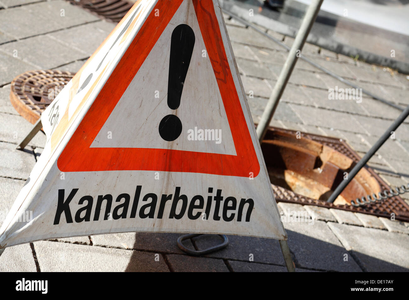 Warning sign, lettering 'Kanalarbeiten', German for 'drain works' in the historic district of Ellwangen an der Jagst Stock Photo