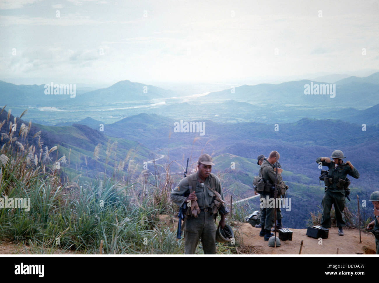 Vietnam War 1957 - 1975, American soldiers in a position on a mountain, South Vietnam, 1965, assignment, mountains, mounts, landscape, landscapes, military, armed forces, army, armies, USA, United States of America, South-East Asia, South East Asia, Southeast Asia, Far East, Viet Nam conflict, Viet Nam, Vietnam, war, wars, conflict, conflicts, 1960s, 60s, 20th century, people, group, groups, men, man, male, soldiers, soldier, mount, mountain, peak, peaks, historic, historical, Additional-Rights-Clearences-Not Available Stock Photo