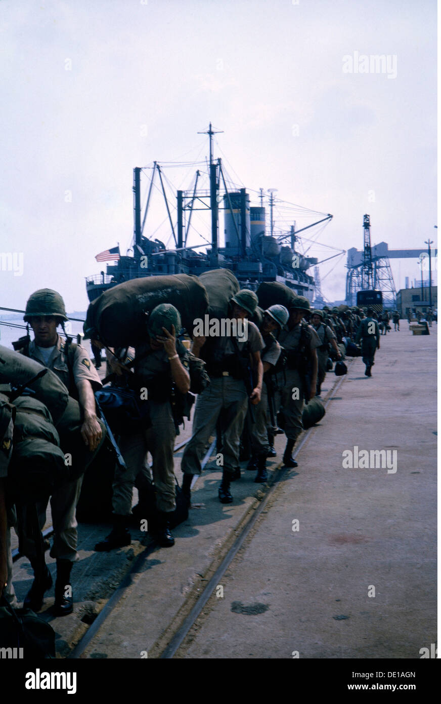 Vietnam War 1957 - 1975,arrival of American soldiers,South Vietnam,1965,harbour,harbor,harbours,harbors,port,ports,ship,ships,baggage,luggage,duffle bag,duffel bag,duffel,duffle,kit bag,duffle bags,duffel bags,duffels,duffles,kit bags,embankment,pier,military,armed forces,army,armies,USA,United States of America,South-East Asia,South East Asia,Southeast Asia,Far East,Viet Nam conflict,Viet Nam,Vietnam,war,wars,conflict,conflicts,1960s,60s,20th century,people,group,groups,men,man,male,soldiers,soldier,histori,Additional-Rights-Clearences-Not Available Stock Photo