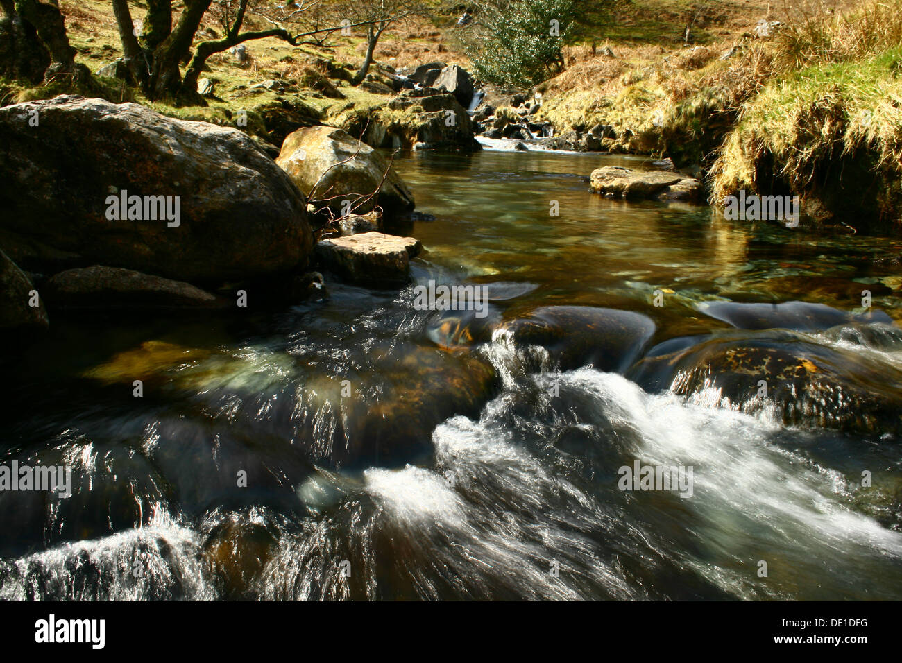 Fast flowing stream over rocks hi-res stock photography and images - Alamy
