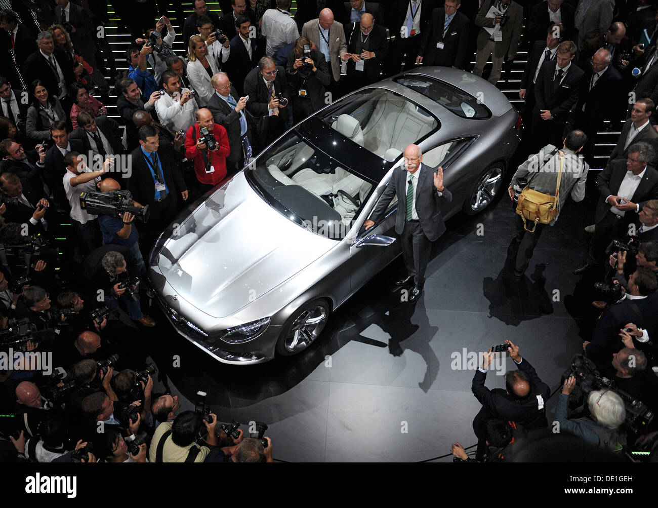 Frankfurt, Germany. 10th Sep, 2013. Chairman Dieter Zetsche stands next to the new Concept S-Class Coupe at the Mercedes Benz stand during the press day of the Frankfurt Motor Show IAA in Frankfurt, Germany, 10 September 2013. One of the most important car exhibitions in the world, Frankfurt Motor Show will be opened officially 12 September by German Chancellor Angela Merkel, running until 22 September 2013. Photo: UWE ZUCCHI/dpa/Alamy Live News/dpa/Alamy Live News Stock Photo