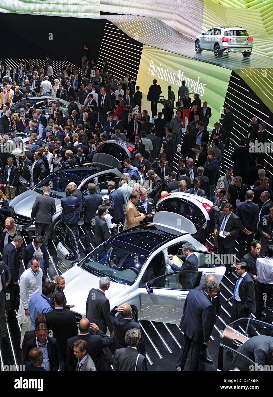 Frankfurt, Germany. 10th Sep, 2013. Tthe Mercedes Benz stand is crowded during the press day of the Frankfurt Motor Show IAA in Frankfurt, Germany, 10 September 2013. One of the most important car exhibitions in the world, Frankfurt Motor Show will be opened officially 12 September by German Chancellor Angela Merkel, running until 22 September 2013. Photo: UWE ZUCCHI/dpa/Alamy Live News/dpa/Alamy Live News Stock Photo