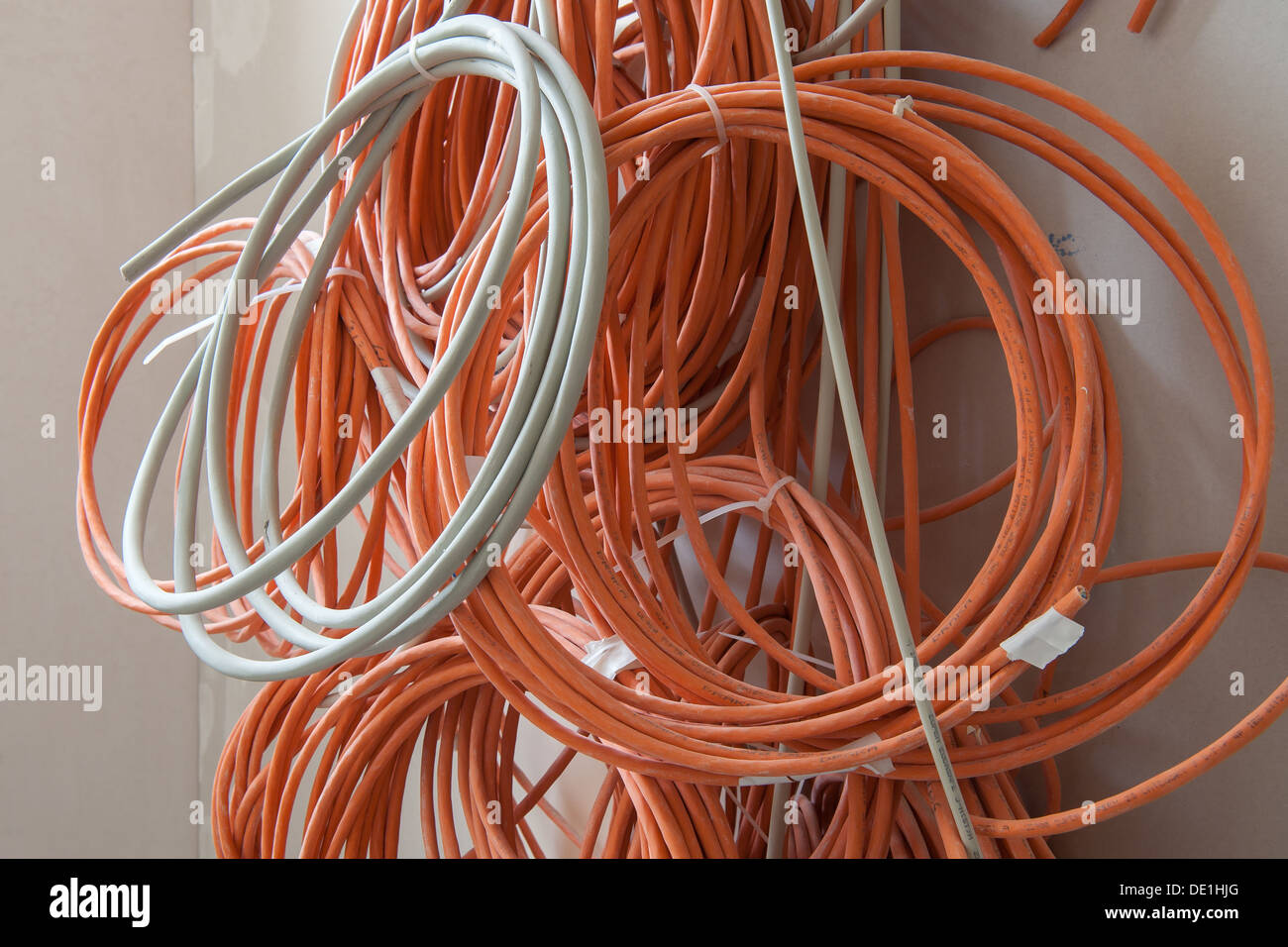 Berlin, Germany, multipolar cables hanging on a wall Stock Photo