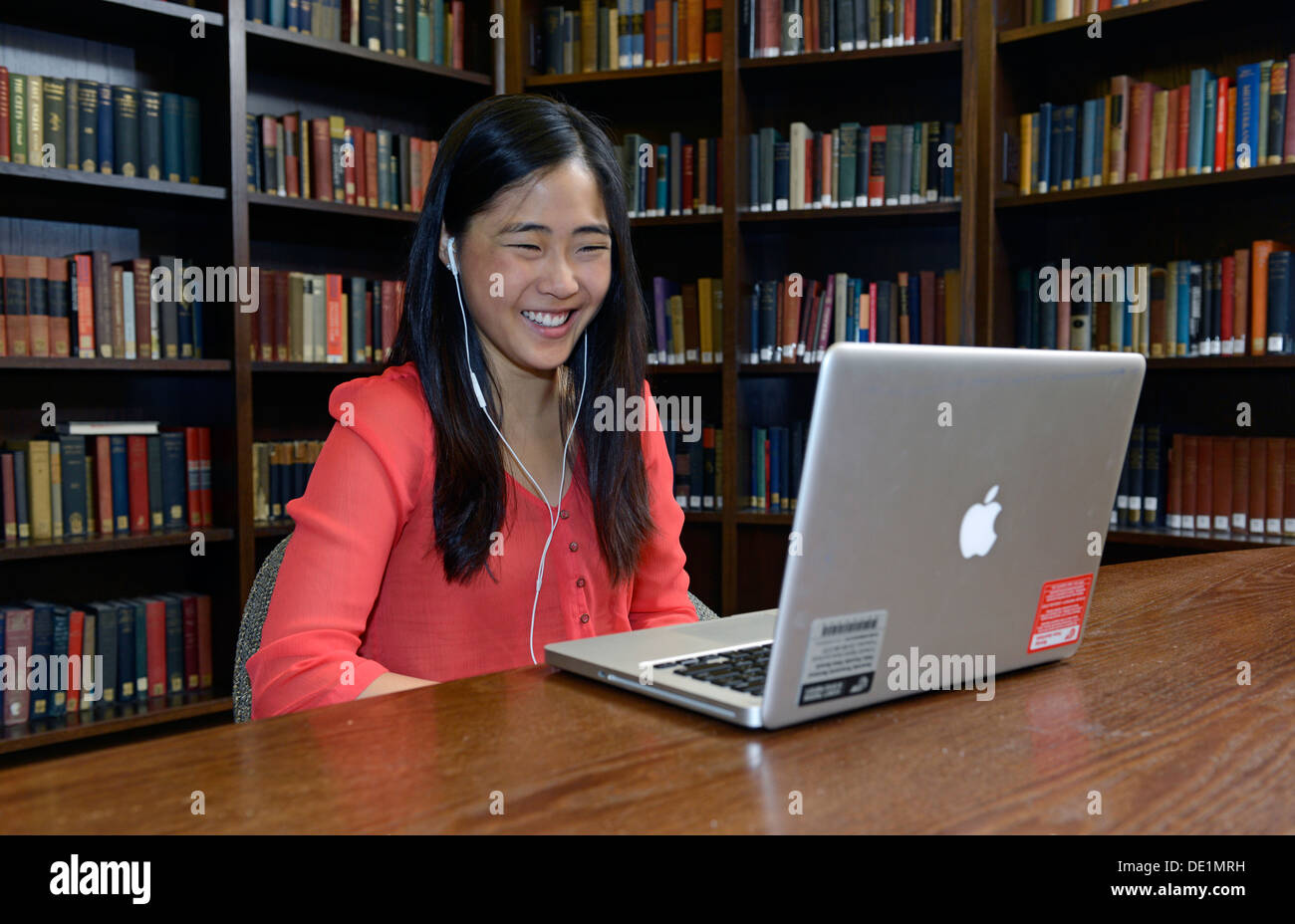 Yale student  logs into the Yale network on her computer. Stock Photo