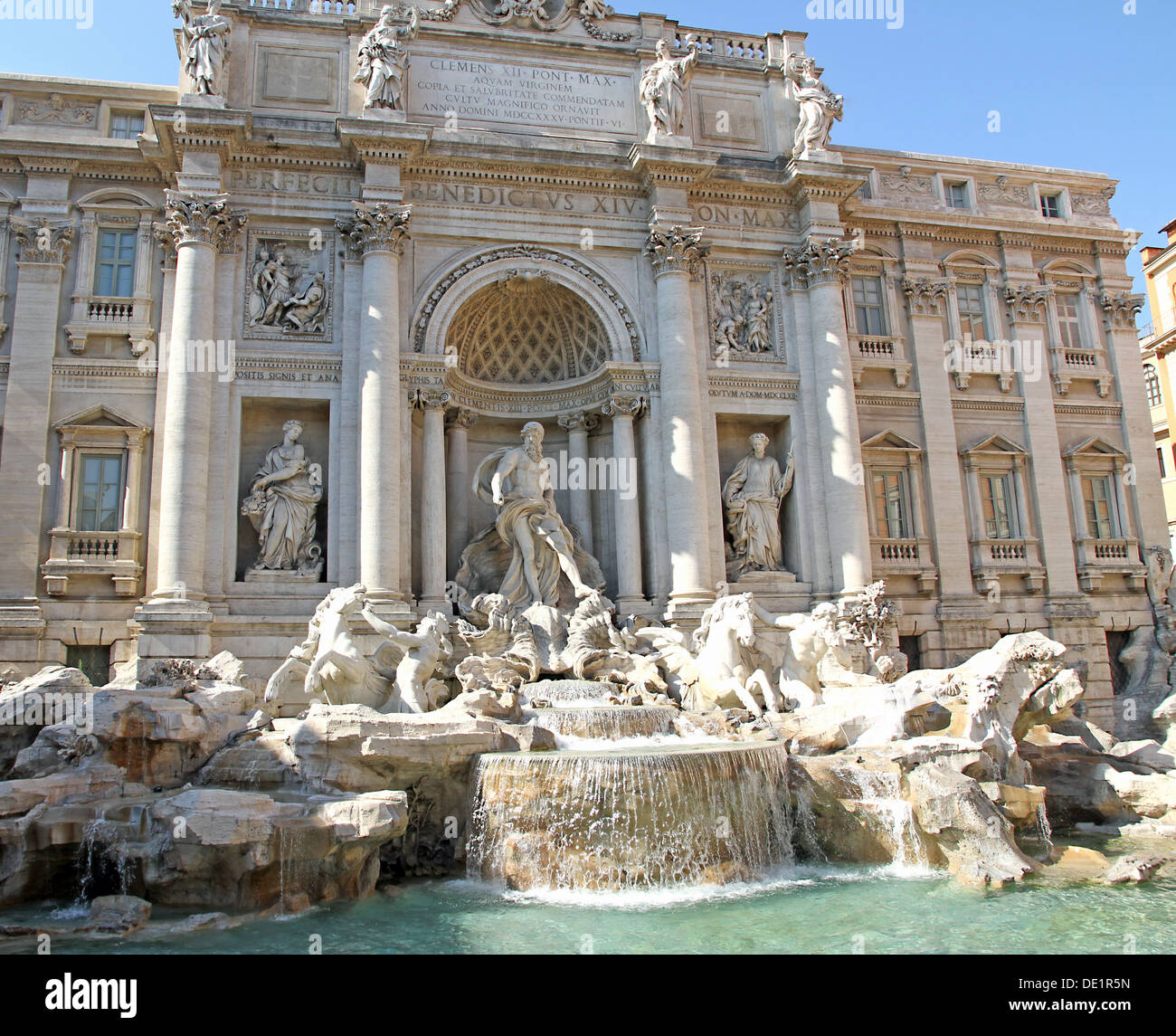 beautiful fontana di trevi in Rome with white marble statues Stock Photo