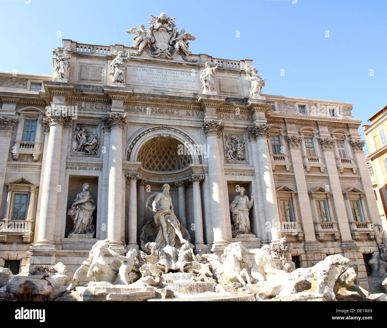 Fountain of trevi in Rome center with white marble statues Stock Photo