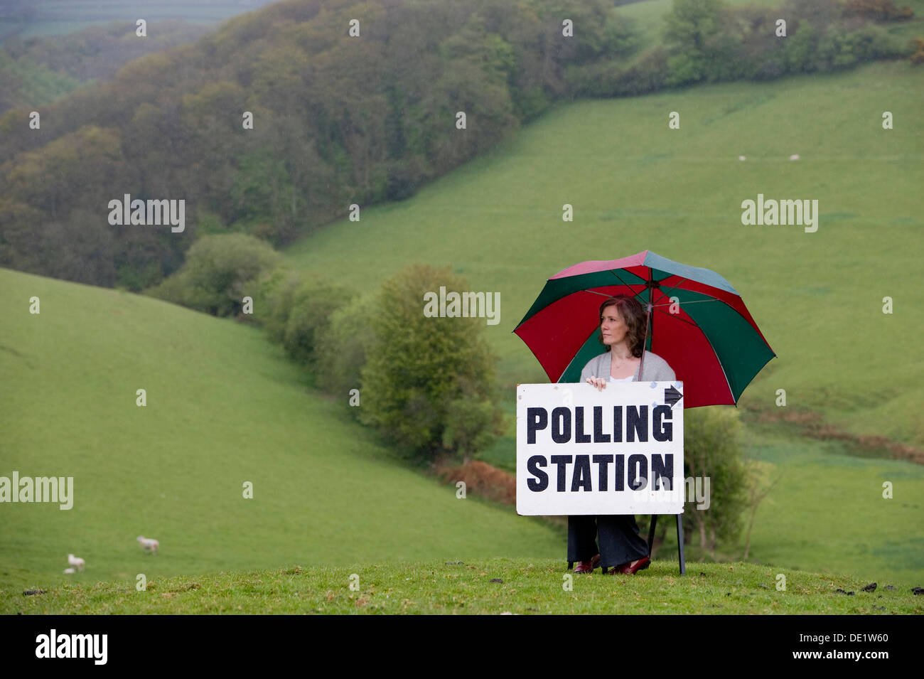 Residing Polling officer Sharon Gullick outside rural polling station at Shirwell in North Devon during election time, UK Stock Photo