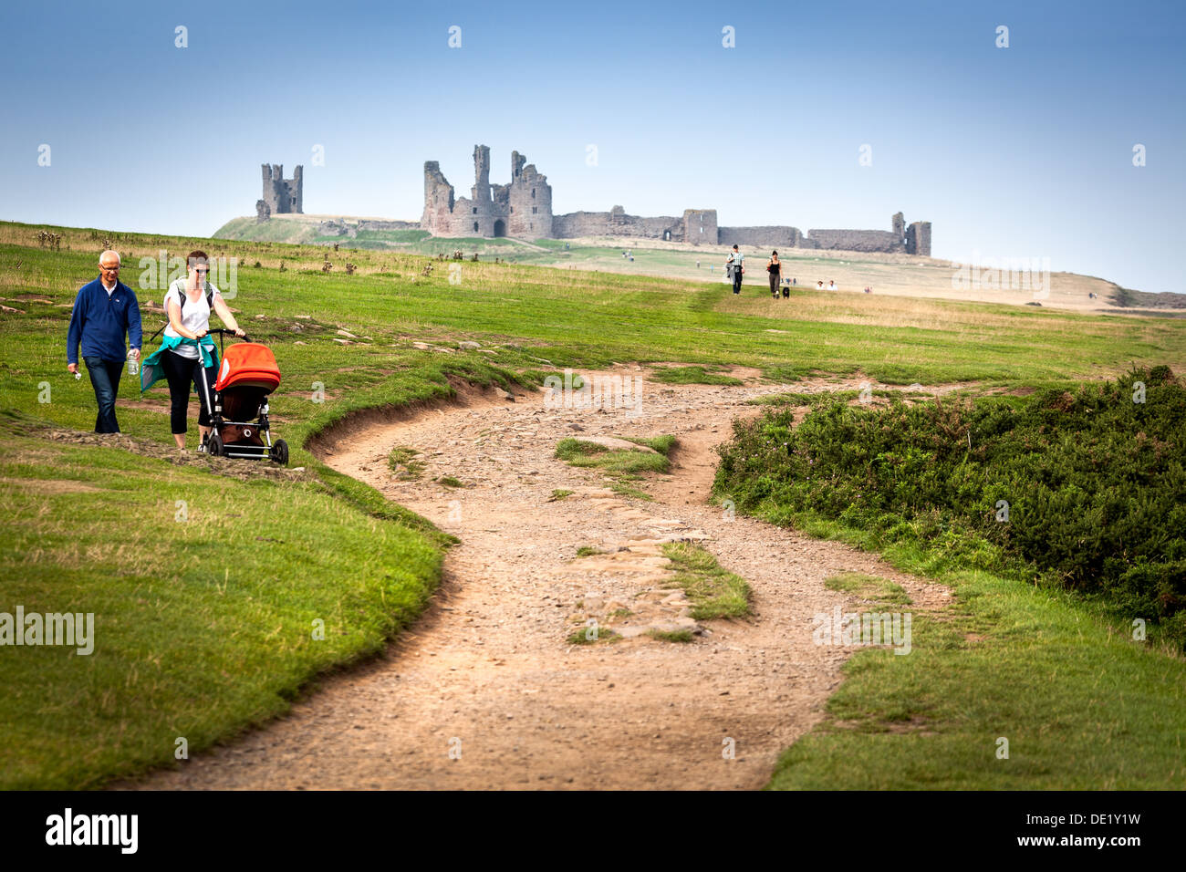 Walk to Dunstanburgh Castle from Craster, Northumberland, England, UK, GB Stock Photo