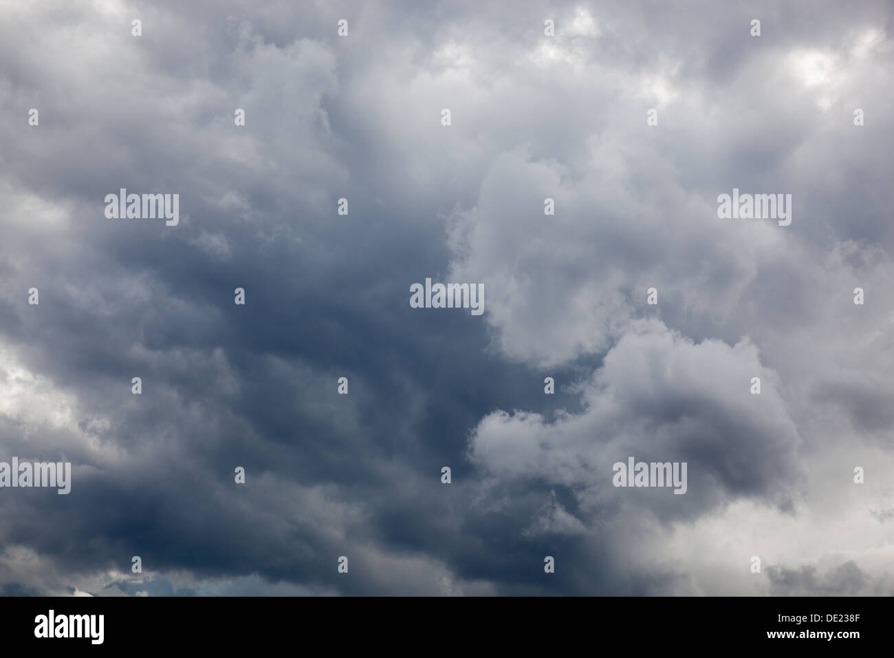 Dark grey clouds gathering Stock Photo