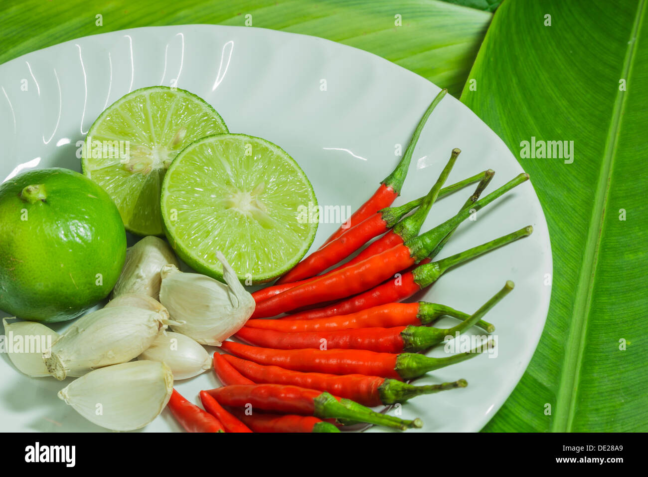 Fresh herbs and spices (chili, garlic, lemon Stock Photo Alamy
