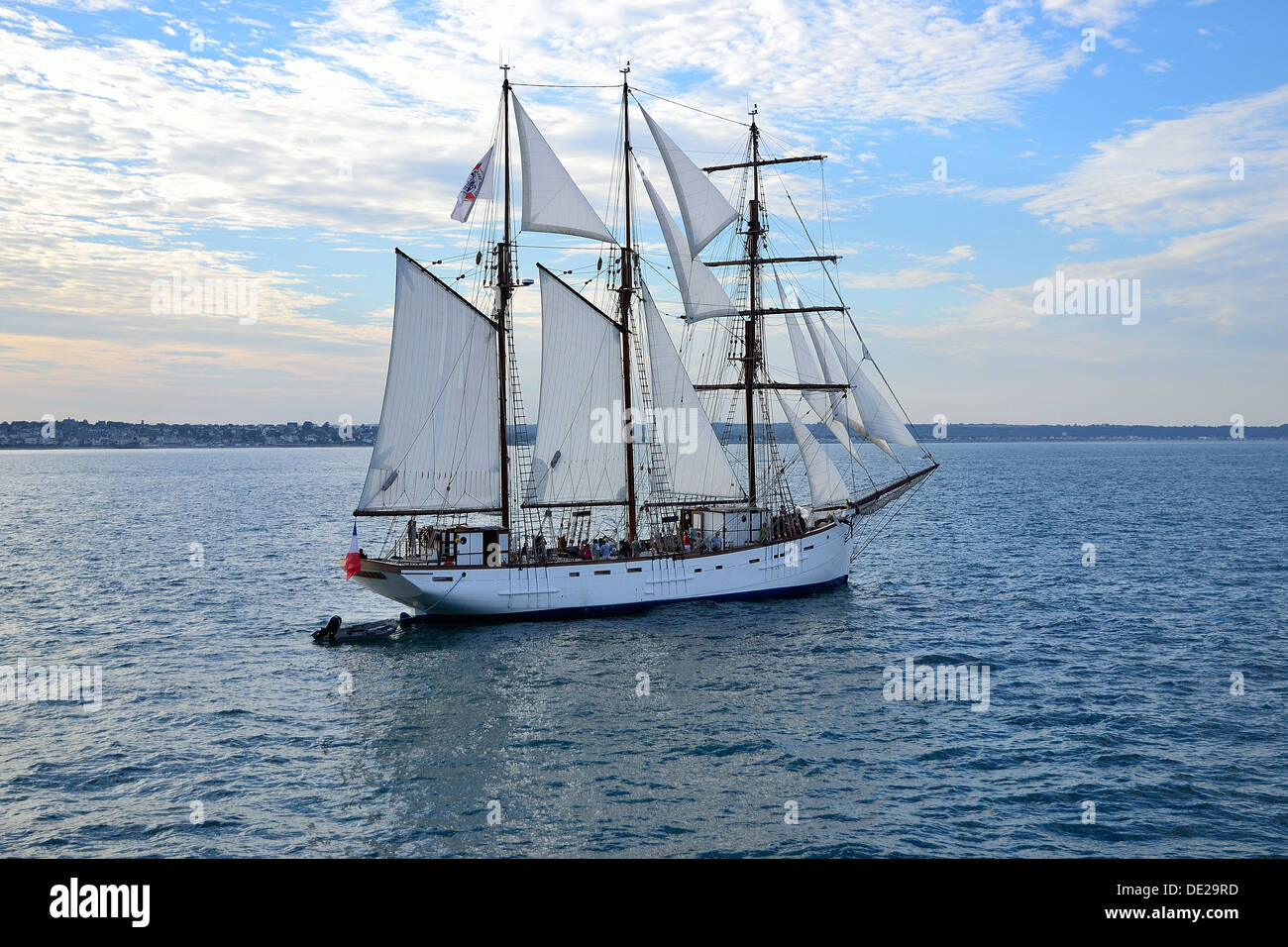 Marité (three-masted schooner, 1921, homeport : Granville), old fishing boat, leaving the fishing port of Granville (Normandy). Stock Photo