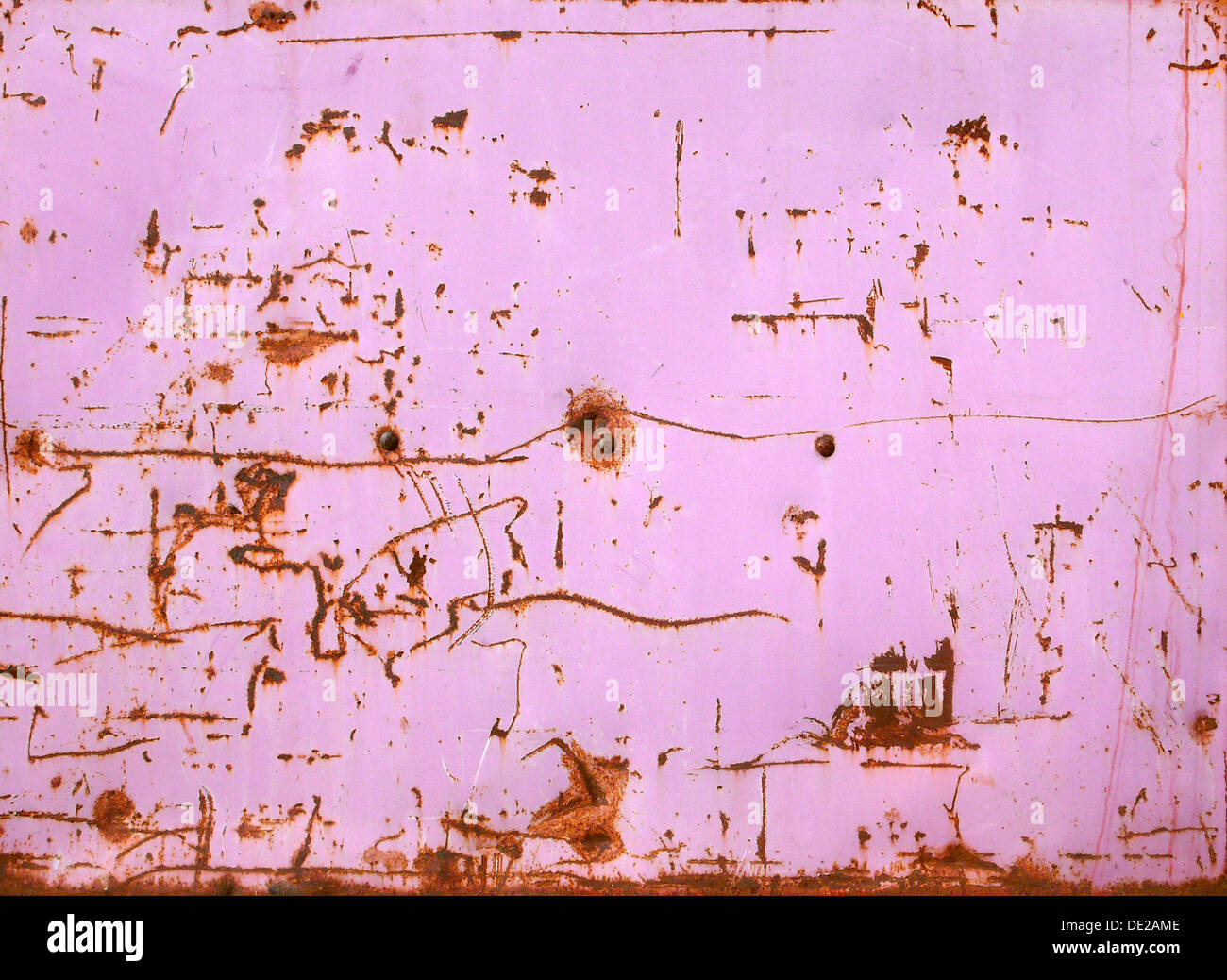Rusty structures on a pink sheet of iron Stock Photo