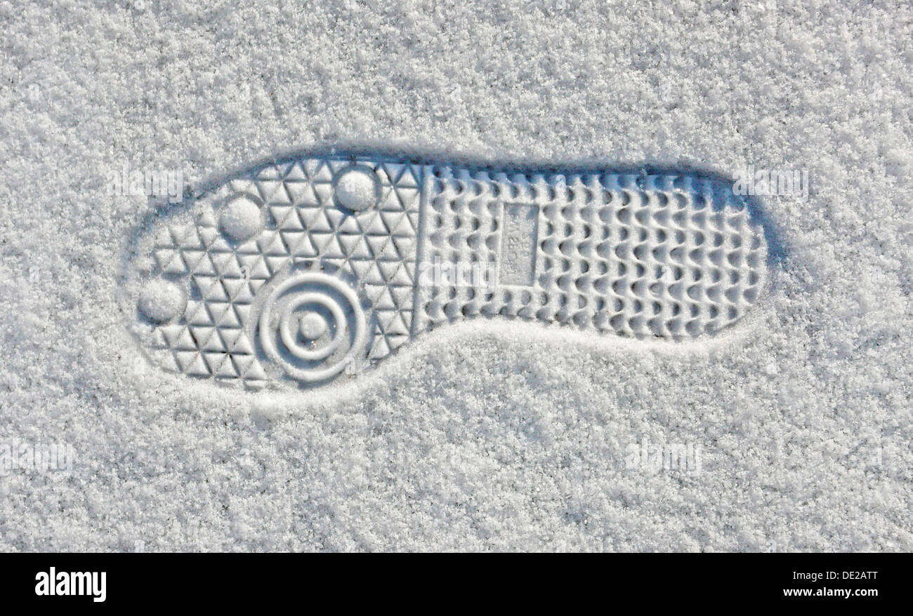 Shoeprint in snow Stock Photo