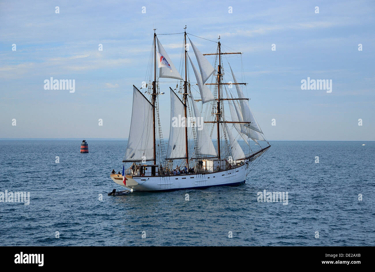 Marité (three-masted schooner, 1921, homeport : Granville), old fishing boat, leaving the fishing port of Granville (Normandy). Stock Photo
