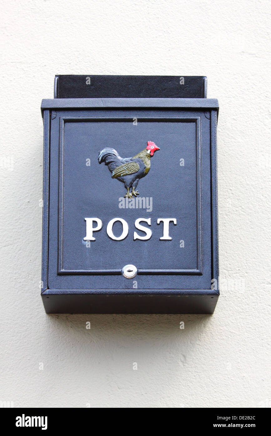 Lockable post box on wall of a private home Stock Photo